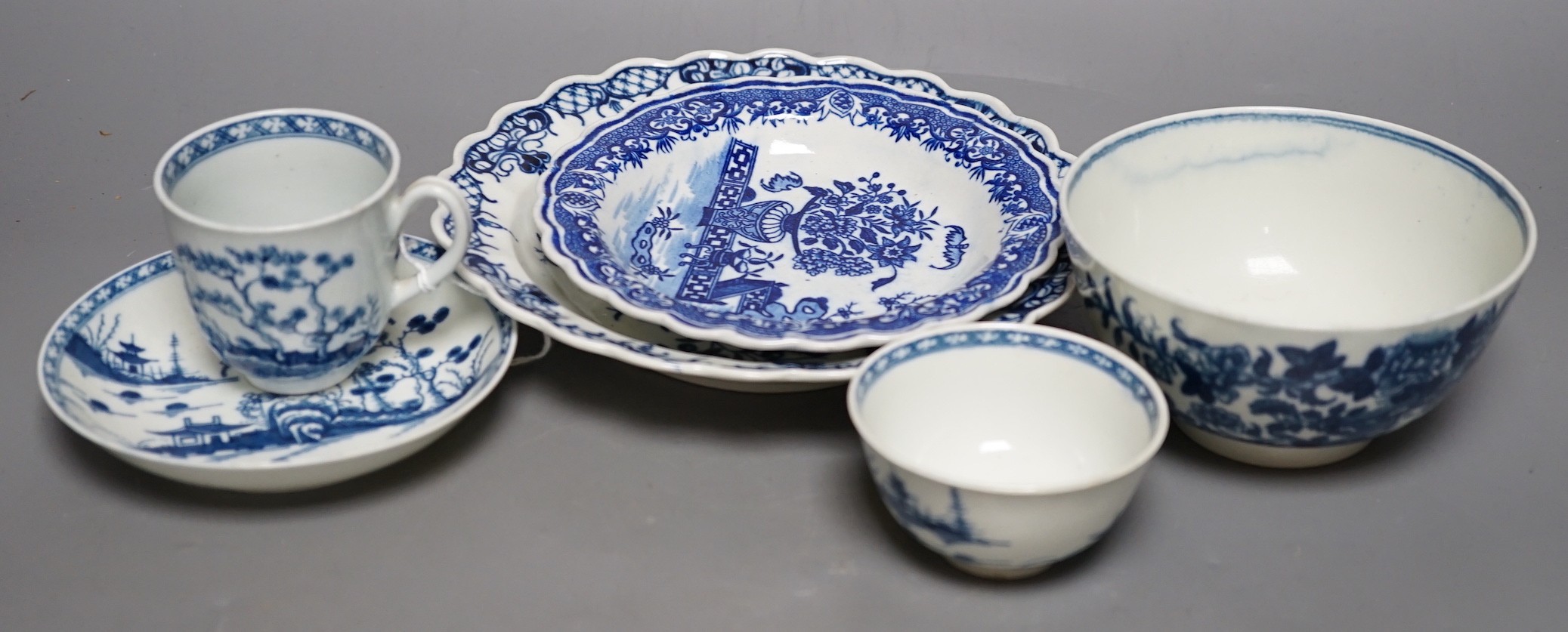 A Worcester teabowl, coffee cup and saucer painted with the Cannonball pattern, a rare napkin plate with the Bat pattern, a medium size Pine Cone plate and a Fence pattern bowl